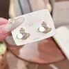 Pendientes Clásicos Europeos y Americanos de Saturno, Pendientes de Moda para Mujer con Forma de Estrella de Colores, Pendientes Exquisitos de Alto Nivel con Circonita de Diamante Completo