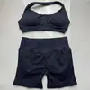 En Stock Dfyne Mismo Estilo Conjunto de Yoga de Alta Elasticidad Sujetador Halter y Conjunto de Shorts Conjunto de Yoga Fitness sin Costuras