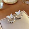Pendientes de mariposa con círculo de perlas frescas y dulces de verano para mujer, pendientes delicados de estilo té de alta gama, pendientes de diseño de nicho