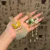 Grampo de cabelo super fada com franjas e lótus para primavera e verão, palito de cabelo estilo antigo para coque, novo pente de cabelo de folha de lótus verde estilo chinês para mulheres, acessório de cabelo Hanfu