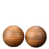 Balón de Balonmano de Madera de Sándalo Se Puede Jugar con Balonmano Fitness. la superficie es lisa y translúcida. Hay dos tamaños disponibles para venta al por mayor de fábrica