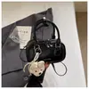 Bolso de nicho de moda para mujer 2026 nuevo modelo casual versátil de alta gama versátil para hombro y cruzado moderno
