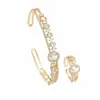 Exquisito y deslumbrante nuevo conjunto de pulsera y anillo de moda para mujer en dos tonos oro y plata con diamantes ovalados y escalonados, fuente mayorista para ventas transfronterizas