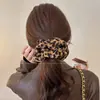 Goma para el pelo de alta gama estilo coreano con estampado de leopardo para mujer 2025 Nuevo accesorio para moño y coleta elegante