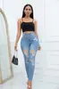Jeans de Mezclilla Elástica de Cintura Alta Temu con Diseño Diagonal de Botones para Mujer Moda Transfronteriza Europea y Americana Rasgados 2026