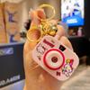 Llavero con lámpara de proyección de cámara pequeña de Sanrio con dibujos animados de Cyber Red, juguete para niños, llavero luminoso con cámara, regalo