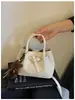 Bolsa de Textura Trançada de Nicho de Luxo Feminina 2026 Nova Moda Retro Versátil Bolsa Transversal Bolsa de Mão Bolsa Saco