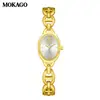 Mokago relógio feminino versátil temperamento mostrador madrepérola pulseira de metal relógio incrustado com strass formato de coração moderno relógio de quartzo atacado