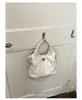 Bolsa de mão feminina estilo Chanel transfronteiriça com bordado de diamante, bolsa de ombro tipo balde, bolsa transversal popular de luxo discreto para passeios
