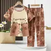 Roupas de Casa para Crianças 2025 Verão Novo Estilo Coreano Desenho Animado Fofo Meninos e Meninas Manga Curta Calça Conjunto para Casa Atacado