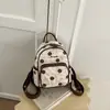 Mochila pequena estilo coreano, bolsa casual para o dia a dia, nova moda 2026 e bolsa de mão estilosa, adequada para trabalho e deslocamento, mochila feminina