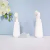 En stock botella cónica blanca de espuma de 60 ml, botella espumadora de PET para mousse de 100 ml, dispensador portátil de espuma facial