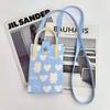 Novo Ins Bolsa de Celular Tricotada Mais Fácil de Combinar Bolsa de Mão Personalizada Desenho Animado Fofa Bolsa Tote de Mão para Senhoras Macia e Fofa