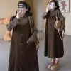 Ropa de maternidad otoño e invierno nuevo conjunto de dos piezas de peto de pana estilo coreano conjunto de base a rayas de cintura alta que cubre la barriga
