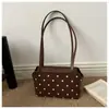 Bolso de mujer 2026 nuevo modelo, bolso cuadrado pequeño versátil de alta gama, bolso de hombro elegante y sencillo, bolso elegante para el trabajo para mujer