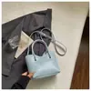 Bolso de cubo tejido de nicho transfronterizo 2026 nuevo bolso de cesta de moda para mujer bolso de mano simple para hombro cruzado