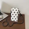 Bolsa de teléfono tejida color caqui de diseño nicho de verano para mujer, nuevo estilo 2026 bolso pequeño cuadrado de paja, bolso de hombro y cruzado