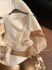 Chaleco de Punto Sin Mangas con Cuello en V Hueco de Avena Falso Dos Piezas para Mujer Verano 2026 Nuevo Estilo Old Money Temperamento Top Adelgazante