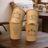 Taza desechable estilo ins engrosada comercial patrón de dibujos animados taza de papel para el hogar taza de leche de soja cara sonriente taza de agua al por mayor