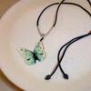 Collar de mariposa de color estilo étnico de nicho para mujer, cadena de clavícula de estilo chino de alta gama, colgante de nicho, elegante cadena de lana