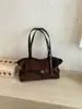 Tendência de moda transfronteiriça bolsa grande feminina nova casual retrô bolsa tote grande capacidade versátil para o dia a dia bolsa de ombro única moderna