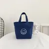 Bolsa de Lienzo con Cara Sonriente Ins Estilo Simple Bolsa Tote Bolsa para el Almuerzo Bolsa Cuadrada Pequeña Portátil Bolsa Casual para Mujer