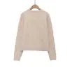 Exportación al por mayor Ropa de mujer 2025 Otoño e Invierno Estilo Europeo y Americano Cuello redondo Mangas largas Color contrastante Rombo Decorativo Tejido de punto Gama alta