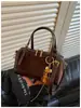 Bolsa Boston com padrão de diamante de design de nicho transfronteiriço para mulheres, nova moda 2026 bolsa pequena de ombro único e transversal