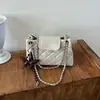 Bolso de cadena de patrón de diamante de alta gama para mujer, moda de otoño transfronteriza, nuevo modelo 2026, gran capacidad, bolso de hombro versátil para el día a día