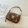 Bolso de mano retro y artístico para mujer de Shuai Mi, nueva colección otoño 2026, bolso tote fresco, bolso de hombro, bolso cruzado y bolso de trabajo