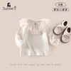 Conjunto de Primavera para Bebé Niña Estilo Coreano Elegante Conjunto para Bebé 2026 Nuevo Modelo Camiseta Básica de Niña Camisola Falda a Cuadros