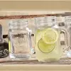 Venta cruzada spot taza creativa para cóctel de té de leche taza para batido de jugo frasco de albañil reutilizable taza con asa