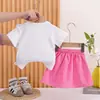 Conjunto de Roupa de Verão para Meninas, Novo Estiloso e Fashion de Verão 2026 Conjunto de Duas Peças com Manga Curta e Shorts para Bebês de 1-3 Anos, Tendência Atacado