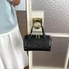 Bolso bandolera coreano texturizado con un toque de lujo ligero, bolso pequeño cuadrado simple de verano, nuevo bolso de hombro tejido versátil para mujer 2026