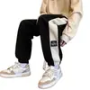 Fabricante Directo Pantalones de Chándal para Hombre Primavera y Otoño Pantalones Casuales Sueltos Marca de Moda Pierna Ancha Puños Color Sólido Sencillo Estilo Japonés Pantalones Deportivos