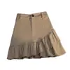 Falda de mezclilla irregular para mujer Verano 2024 Nueva moda Corta Cintura alta Look adelgazante Línea A Falda ceñida a las caderas