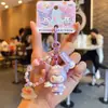 Llavero auténtico de Sanrio, estilo callejero, llavero de Hello Kitty, accesorio lindo y genial para bolsos, pequeño colgante