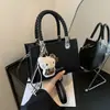 Bolso de mano casual para uso diario para mujer 2026 nuevo elegante de un solo hombro bandolera pequeño cuadrado estilo coreano ins temperamento"""