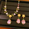 Brincos e colar florais vintage em forma de gota d'água, corrente para clavícula de luxo leve e nicho, conjunto de joias doce e elegante