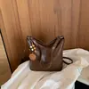 Bolsa de Gran Capacidad para Mujer 2026 Nuevo Verano Bolso de Hombro Retro de Alta Gama Bolso Cruzado Tipo Cubo para Viajes
