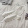Calcetines de algodón puro para mujer, nuevo estilo de otoño, calcetines de encaje hasta la mitad de la pantorrilla, calcetines dulces JK con borde de burbujas, combinados con zapatos pequeños de cuero, calcetines blancos