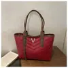 Bolso de mano grande de moda a rayas estilo europeo y americano 2026 con letra bordada simple para mujer, adecuado para ir al trabajo, bolso de hombro tipo tote