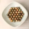 Sándalo Verde Argentino Cuentas Redondas Accesorios de Madera Cuentas Sueltas Cuentas de Buda Fábrica de Joyería Pulseras al por Mayor Cuentas Retorcidas Sándalo Verde Natural Cuentas Sueltas