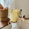 Bolsa Pequeña para Mujer de Marca Extranjera Súper Popular Modelo Nuevo 2026 Bolso para Teléfono de Nicho Bolso Cubo Bolso de Hombro Cruzado Versátil y Elegante