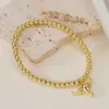 Aogu Transfronterizo Simple Versátil Chapado en Oro de 18 Quilates Cabeza de Toro Geométrico Colgante Pulsera con Cuentas para Mujer Joyería Única Versátil