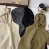 Chaleco Casual de Color Puro a la Moda con Capucha Tejido de Punto para Mujer 2025 Otoño e Invierno Nuevo Suéter Suave Ceroso Tejido de Punto en Capas Transfronterizo