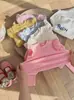 Ropa Infantil Camiseta Básica de Color Sólido 2025 Otoño e Invierno Nueva Estilo Coreano Encaje Manga Volante Superior Camiseta de Manga Larga de Moda para Niñas