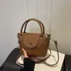 Bolso Vintage Popular de Moda para Mujer 2026 Primavera/Verano Nuevo Bolso Cruzado Casual con Solapa Estilo Coreano Bolso de Mano Bolso Cubo