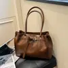 Bolso de Hombro Retro Casual para el Trabajo y el Viaje Diario 2026 Principios de Otoño Nuevo de Moda Gran Capacidad Simple a la Moda Personalidad