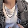 Collar para hombre Collar para mujer Sentido del diseño moderno Nicho Marca de moda Versátil Sentido de alta gama Cuentas de acero de titanio Genial Guapo Accesorios de alta calle